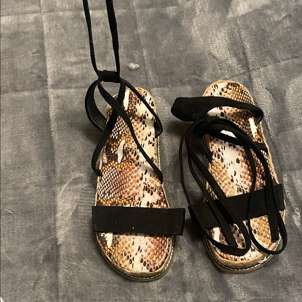 Snakeskin Print Lace-Up Sandals in Black and Tan